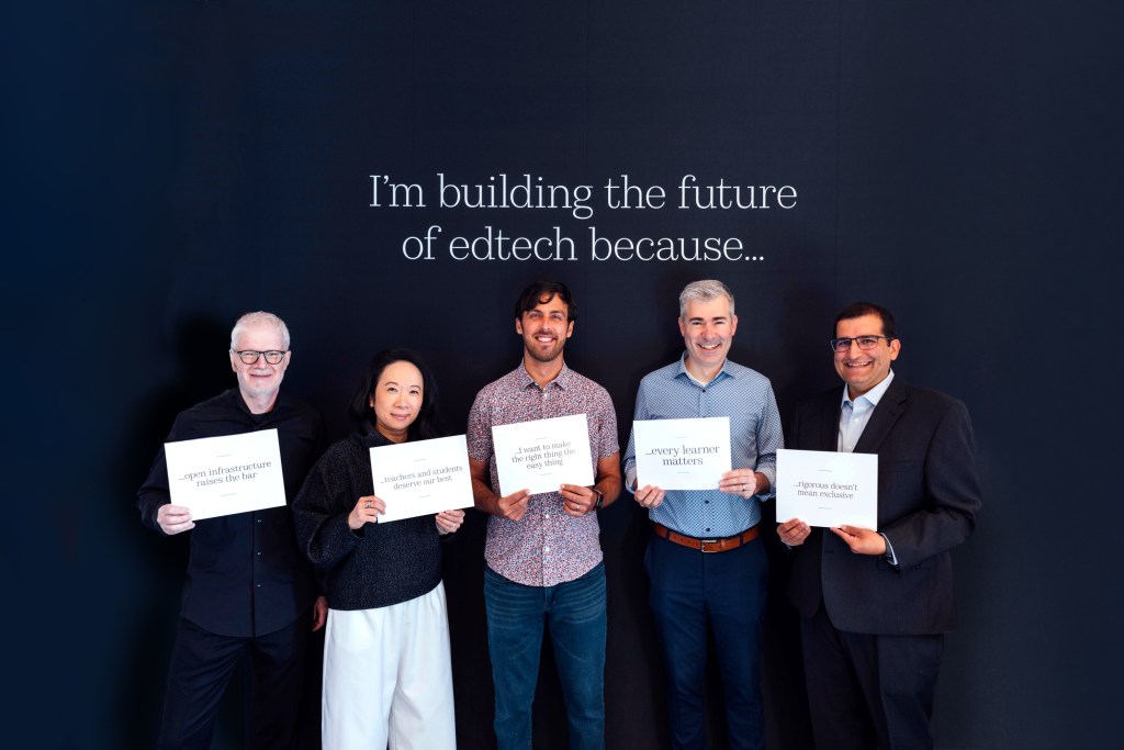 Five people holding personalized signs completing the overhead caption 'I'm building the future of edtech because...'