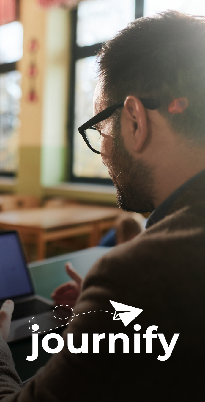 Special education teacher reviewing AI-generated materials on a laptop, with the Journify logo.